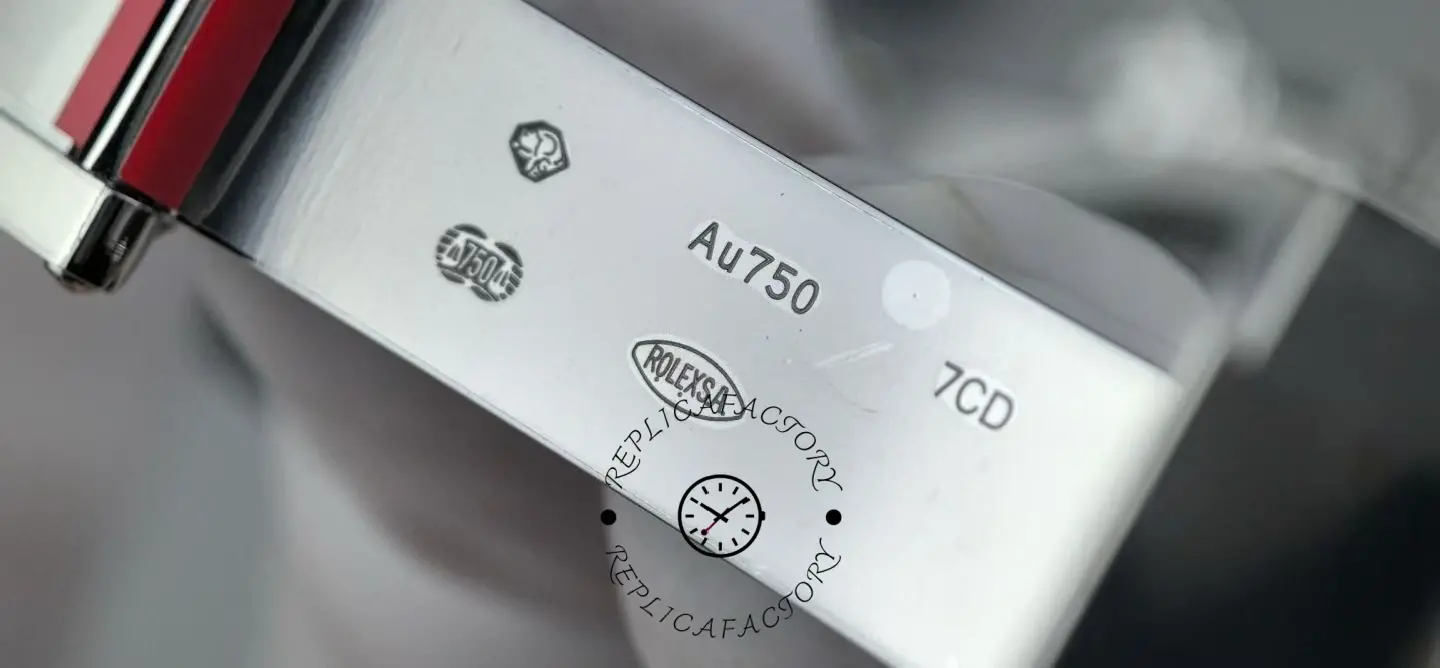 Close-up of Rolex Daytona 126519LN-0004 clasp engraving showing Au750-style and hallmarks detail.