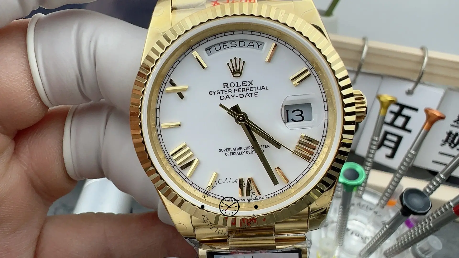 Front view of Rolex Day-Date 228238 with white dial, day window and date magnifier.