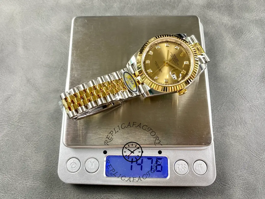 Top-down view of Rolex Datejust M126333-0012 placed on a scale, showing full watch and two-tone bracelet.