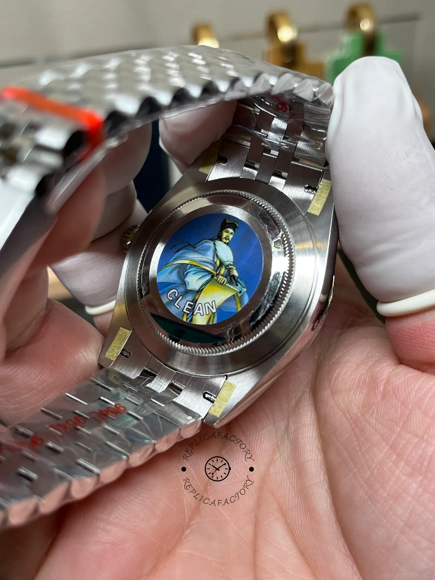 Rear caseback view of Rolex 126334-0018 with CLEAN sticker and stainless steel Jubilee bracelet.
