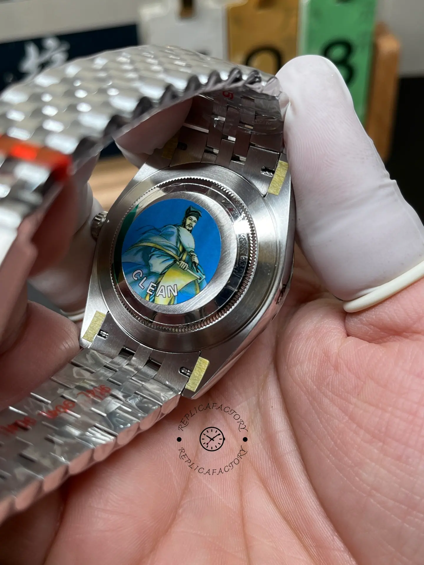 Back view of Rolex Datejust 126334-0028 showing solid caseback and inner bracelet structure.