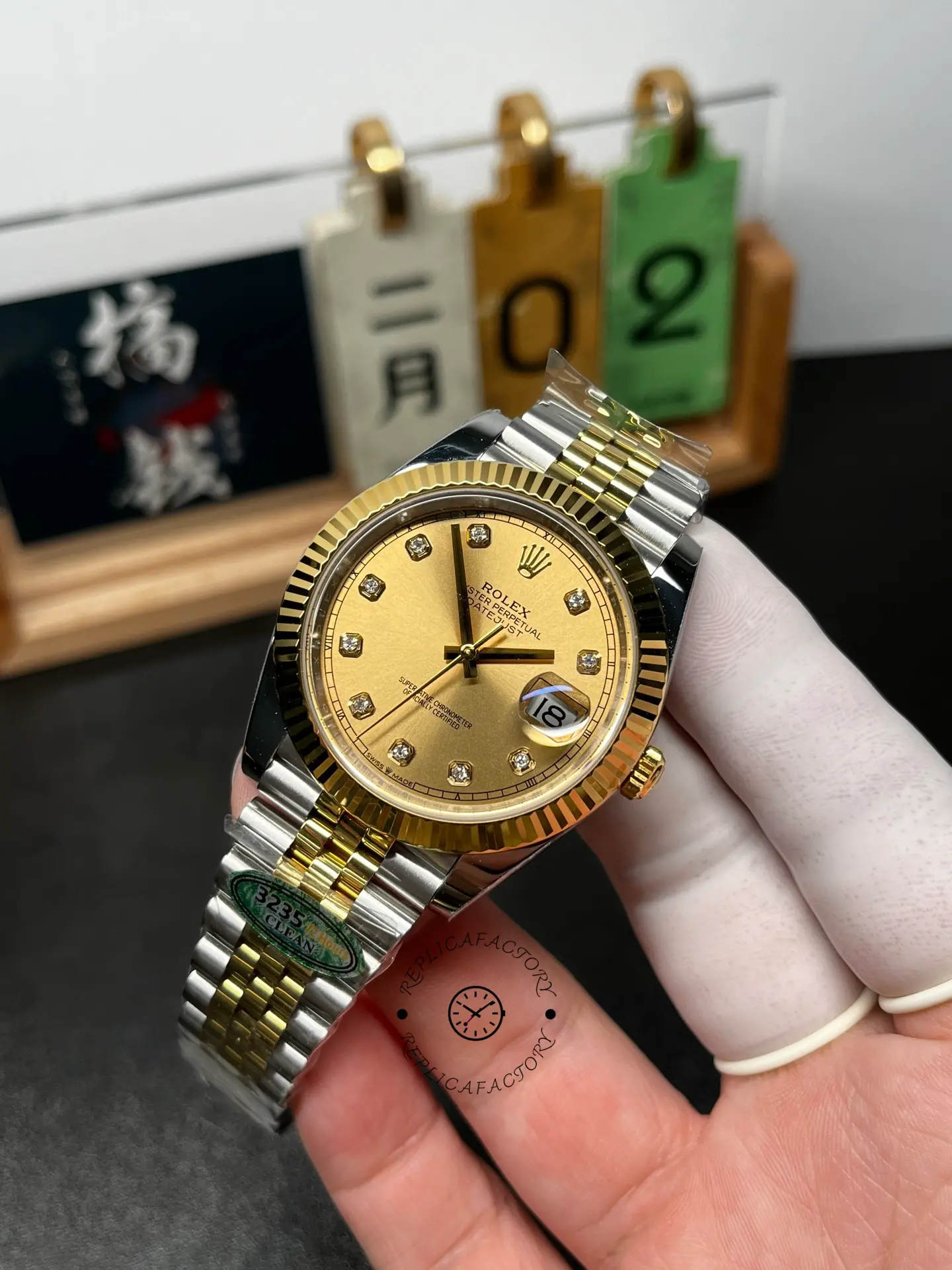 Angled full view of Rolex Datejust M126333-0012 showing the two-tone bracelet and fluted bezel shine.