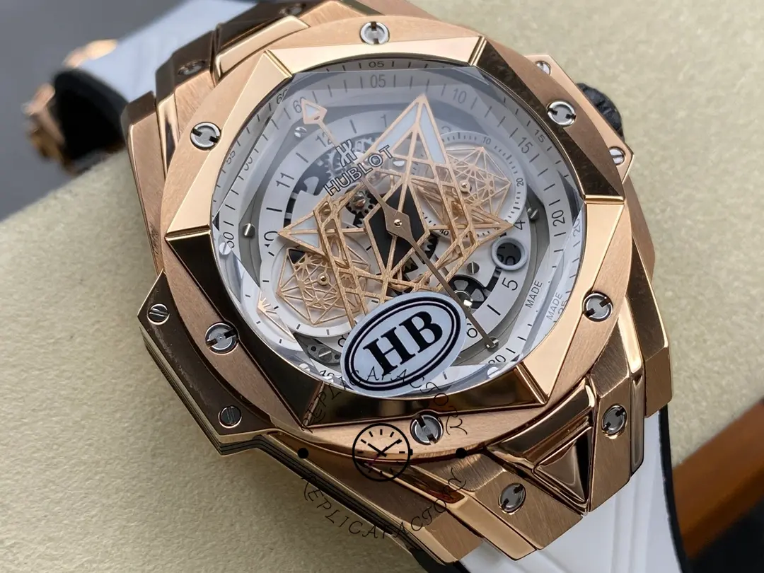 Three-quarter view of Hublot 418.OX.2001.RX.MXM20 showing faceted case edges and white strap.