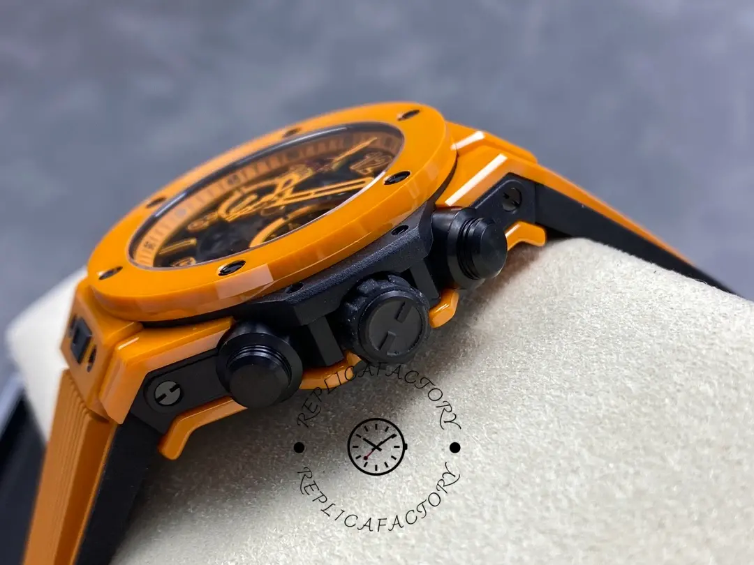 Crown and pusher side view of Hublot 441.CU.5910.RX with textured chronograph pushers and logo crown.