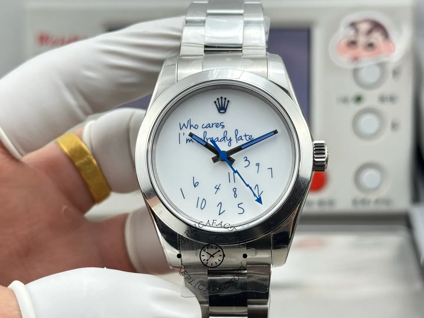 Front handheld view of Rolex Milgauss 116400 with white custom dial and blue contrast hands.