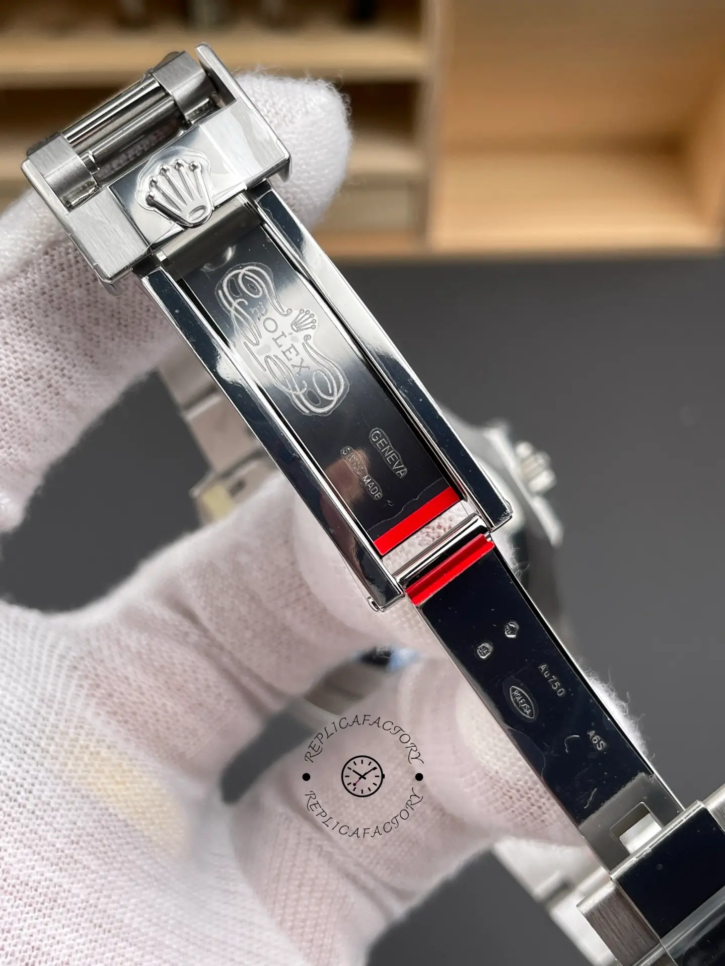 Open clasp view of Rolex GMT-Master II 126719BLRO showing interior clasp engravings and polished steel finish.