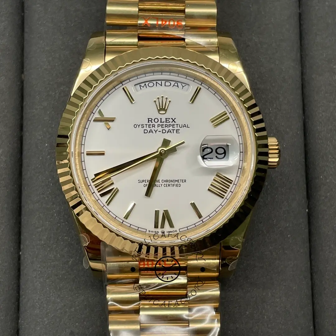Straight front shot of Rolex Day-Date 228238 with white dial and magnified date display.