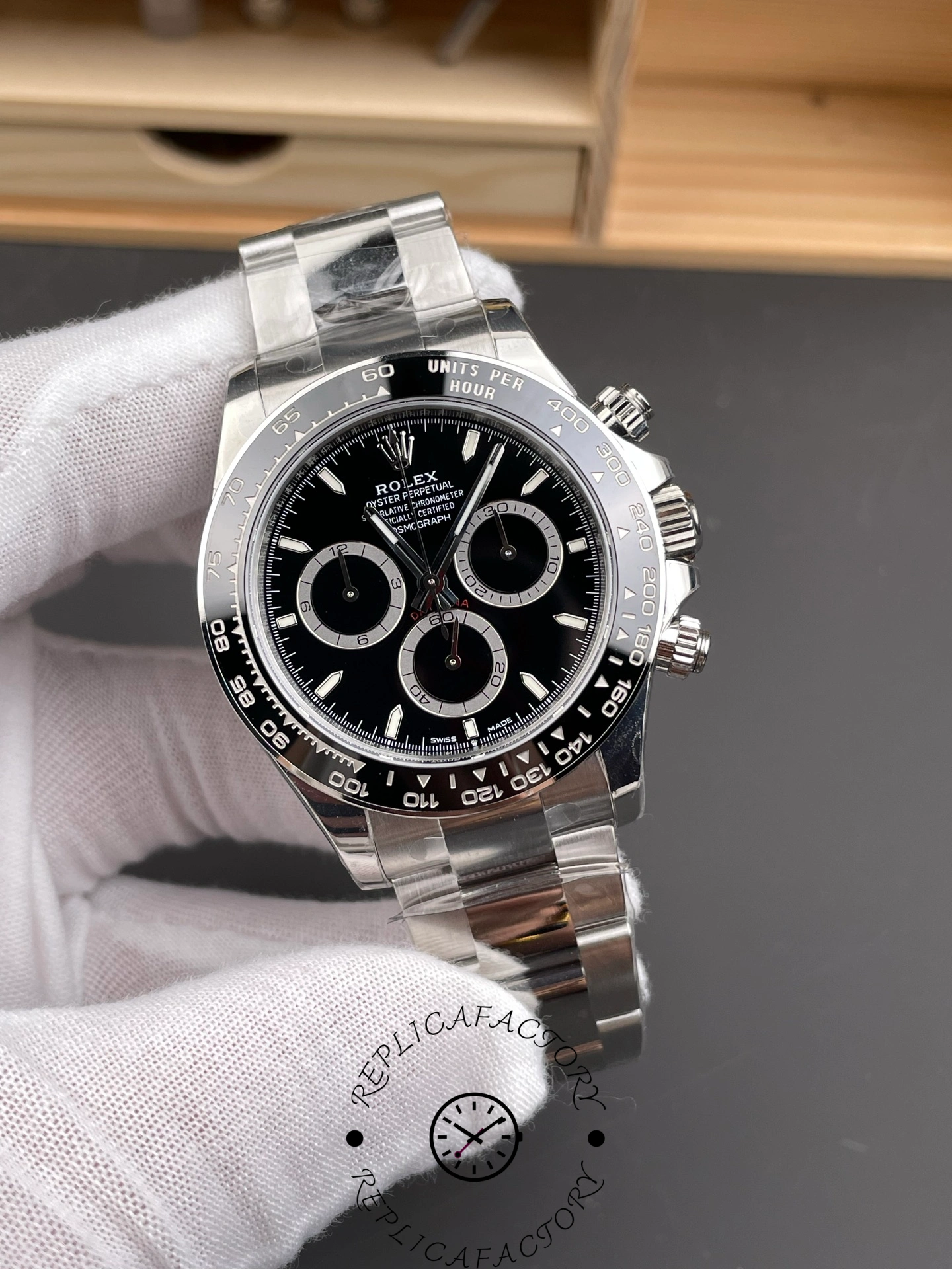 Angled front view of Rolex Cosmograph Daytona m126500LN-0002 showing black dial and subdials.