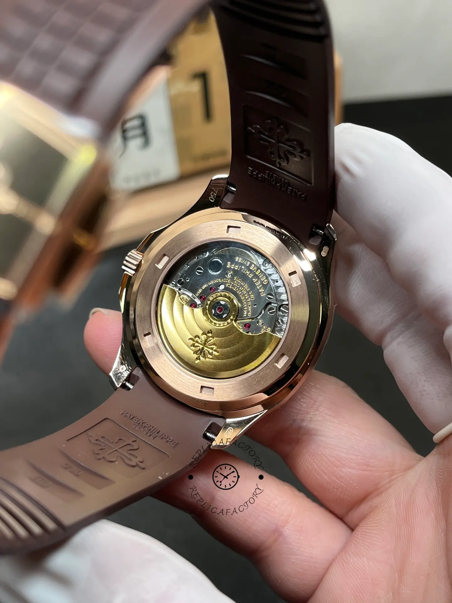 Patek Philippe Aquanaut 5167R-001 caseback view, exhibition back showing rotor and movement.