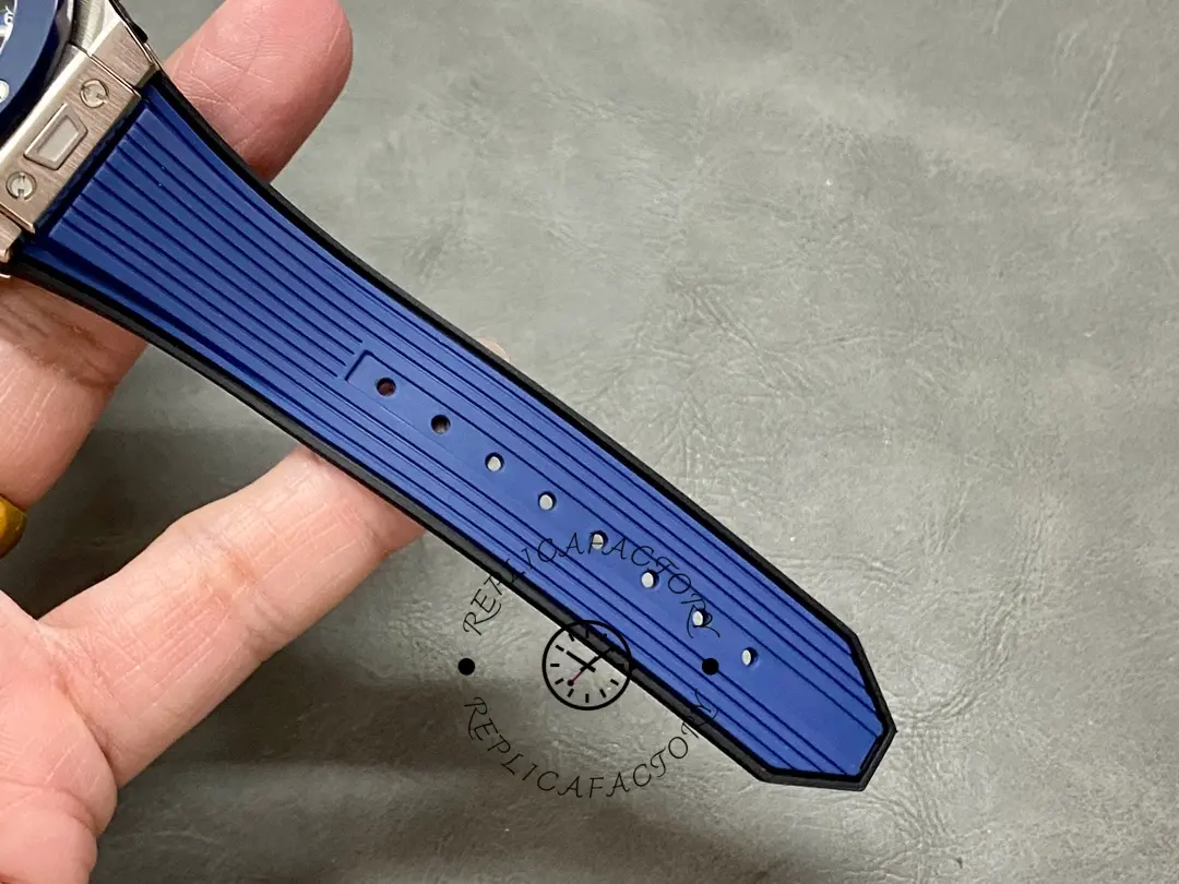 Strap detail of Hublot Big Bang 421.NL.5170.RX blue rubber strap and stitching.