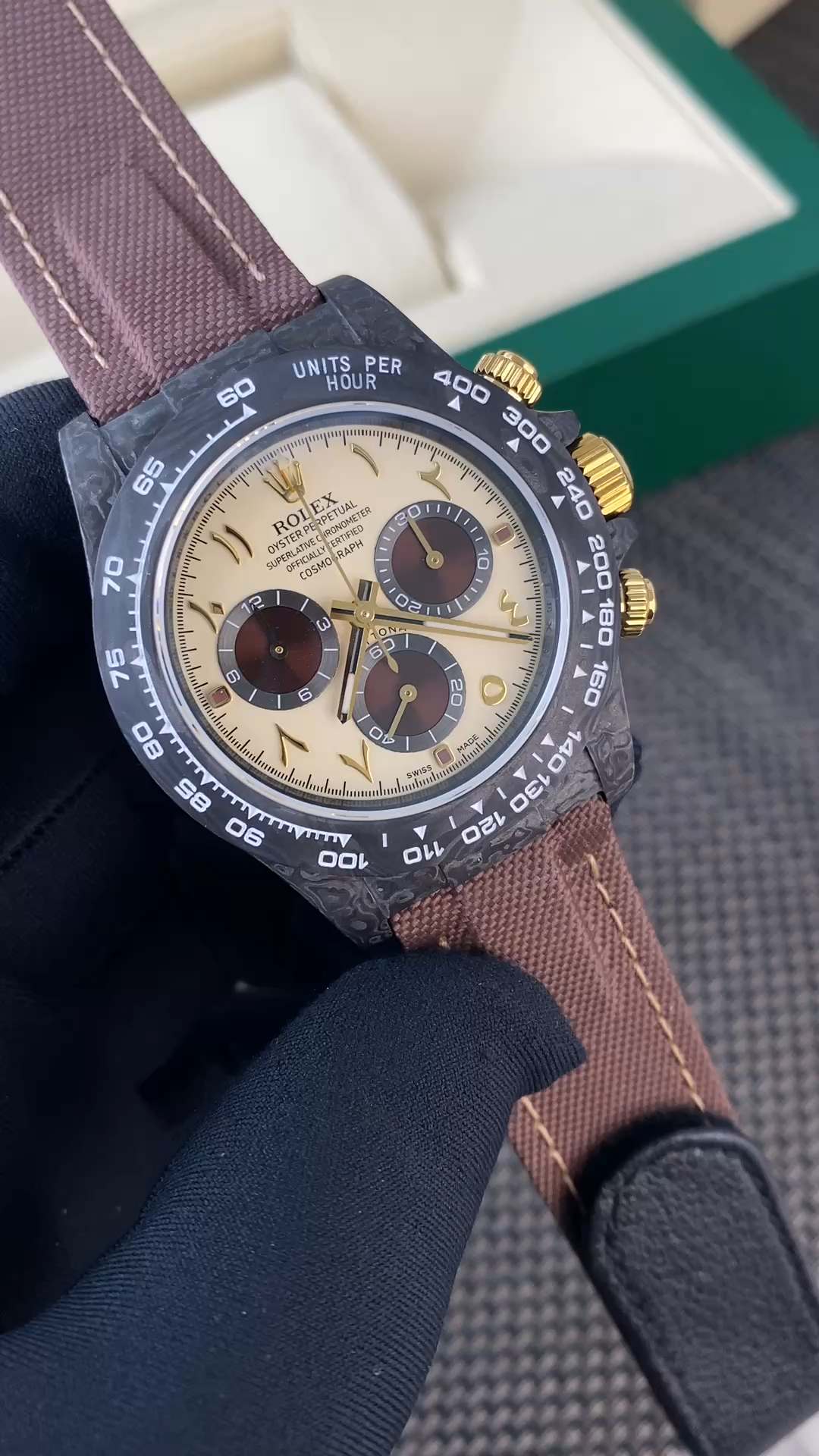 Angled wrist shot of the Rolex Daytona DIW Desert Eagle Arabic Carbon Fiber 40 mm with cream dial. - Video