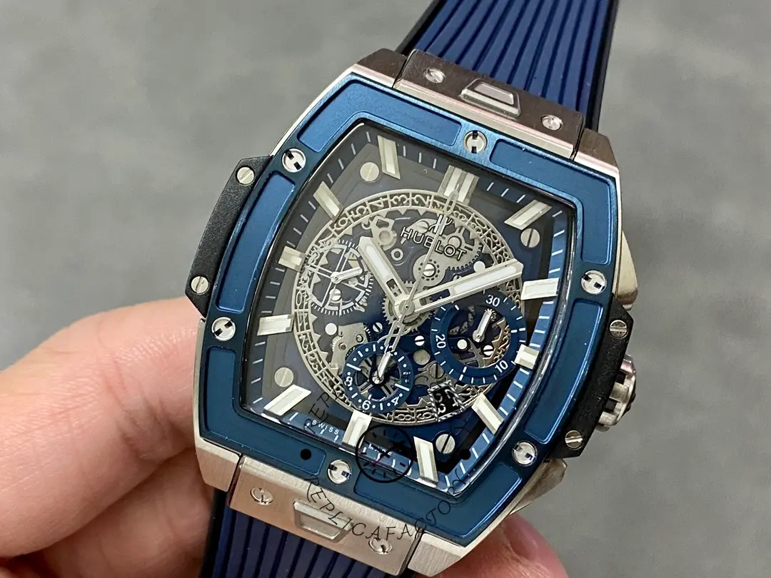 Angled close-up of Hublot 642.NL.7170.RX showing the blue chronograph sub-dials and date window.