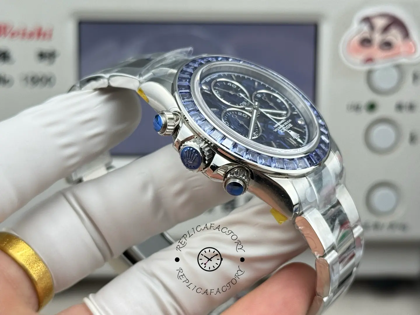 Side profile of Rolex Daytona Arolla Glacier clear dial replica showing crown, pushers and blue cabochon-style accents.