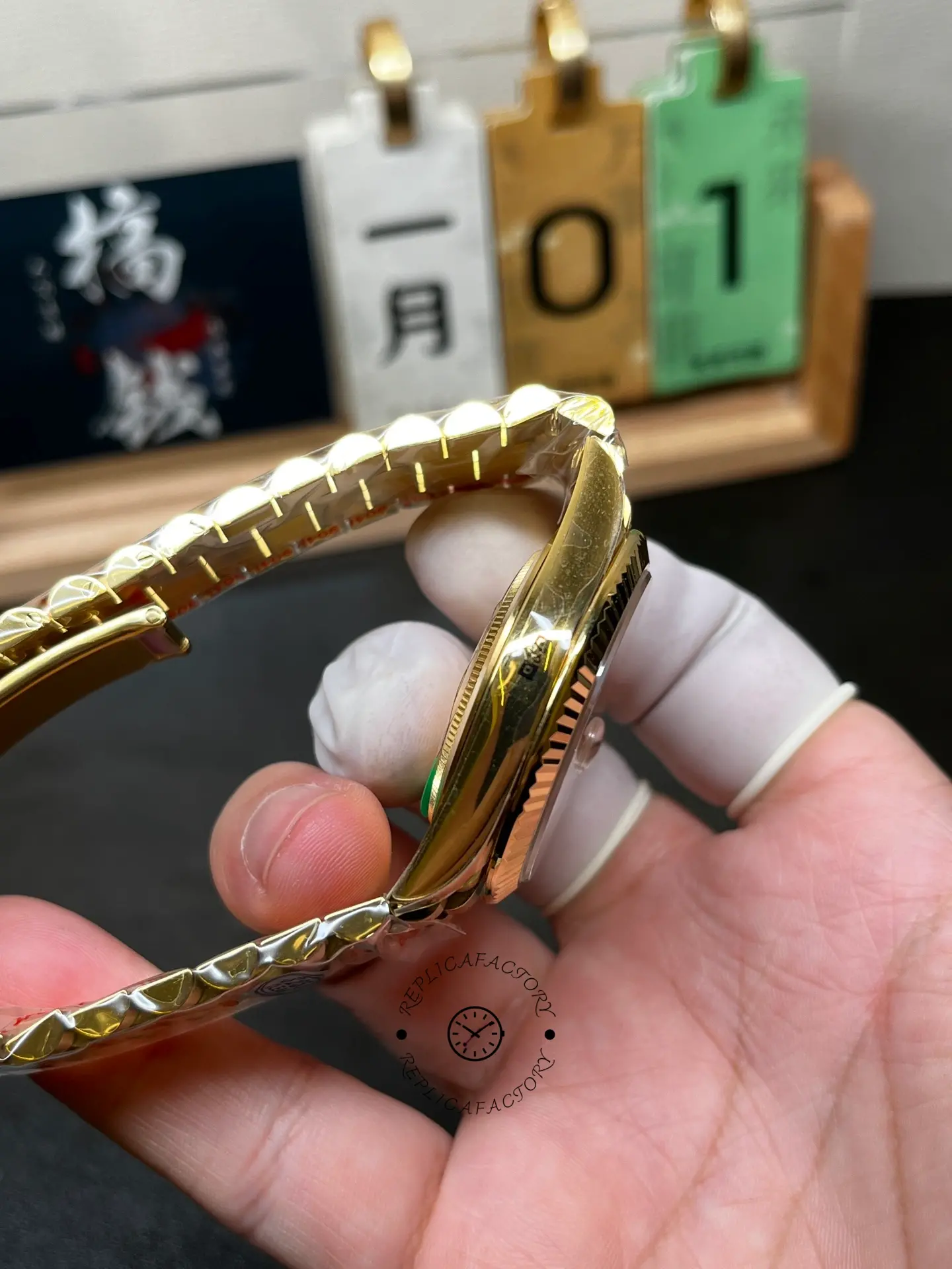 Opposite side view of Rolex Day-Date 40 m228238-0005 showing polished case flank and bracelet curvature.