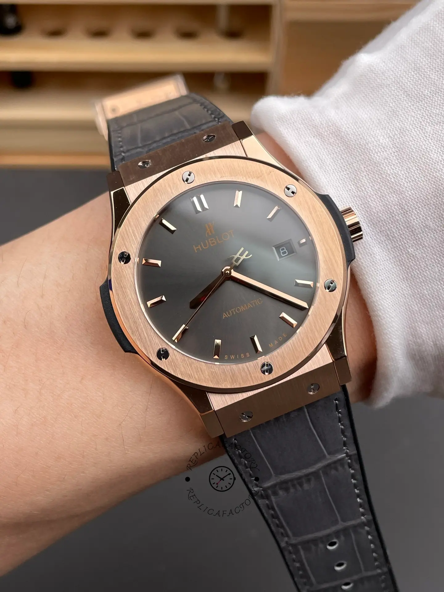 Wrist shot of Hublot Classic Fusion King Gold 542.OX.1181.RX 42mm showing fit and case thickness.