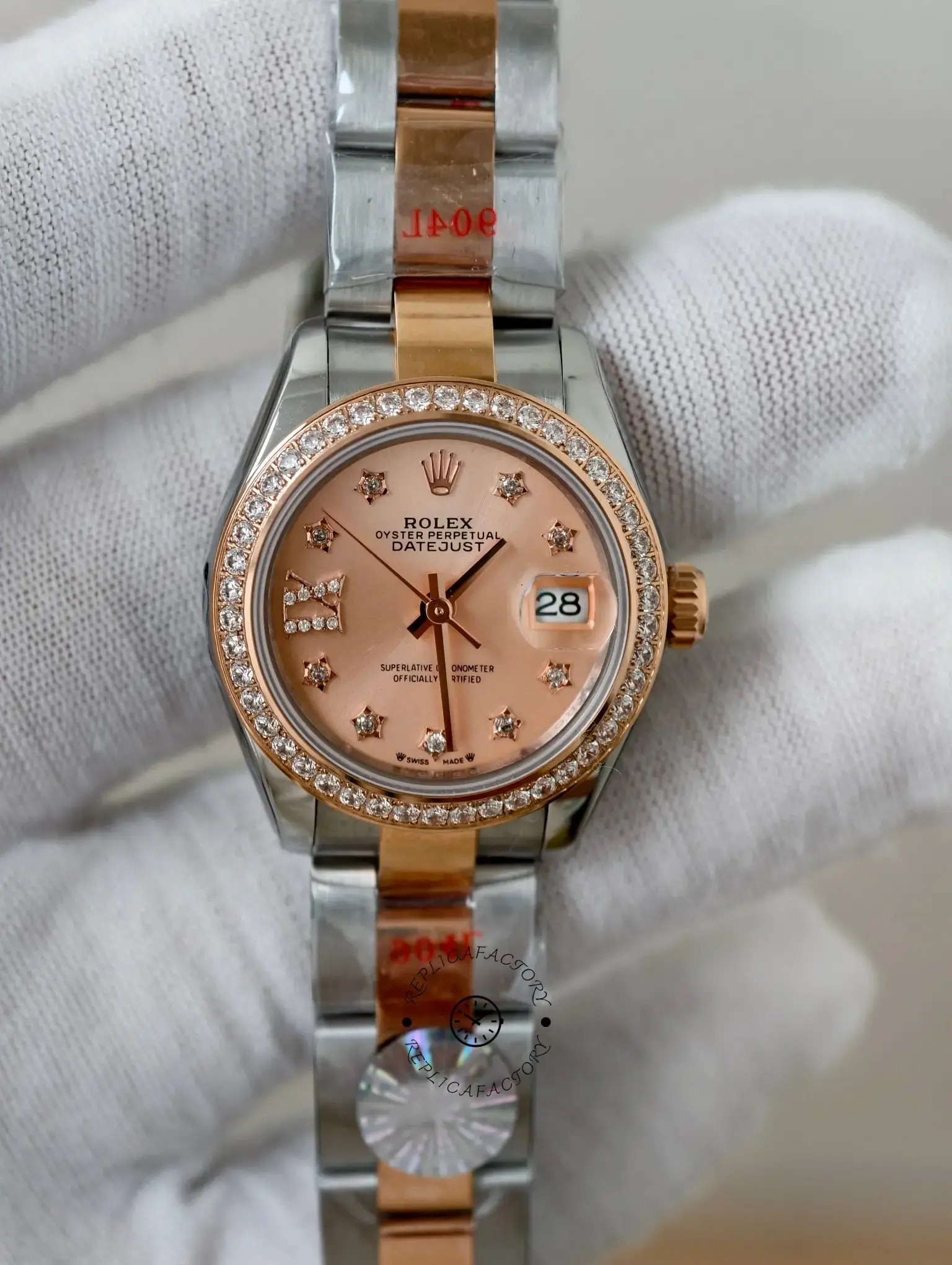 Front close-up of Rolex Lady-Datejust 279381RBR-0028 showing diamond markers, date magnifier, and bezel stones.