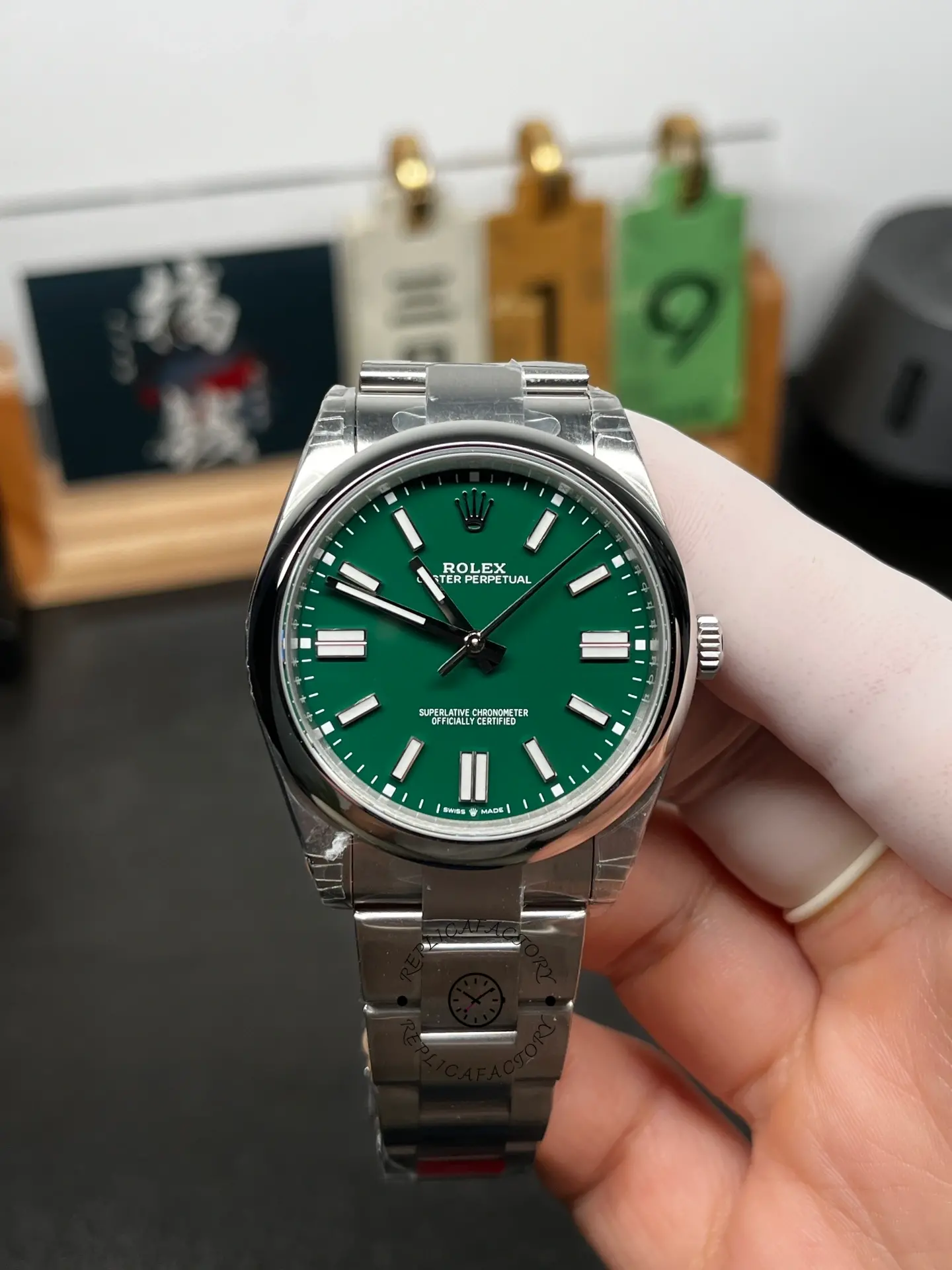 Front view of Rolex Oyster Perpetual 41 134300-0004 with green dial and stainless steel Oyster bracelet.