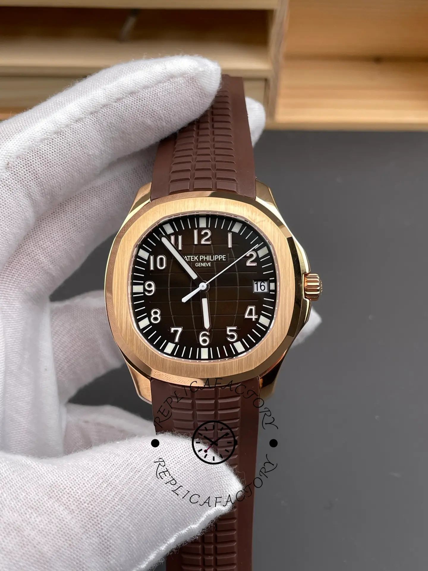 Patek Philippe Aquanaut 5167R-001 brown dial rose gold case with rubber strap front view in hand