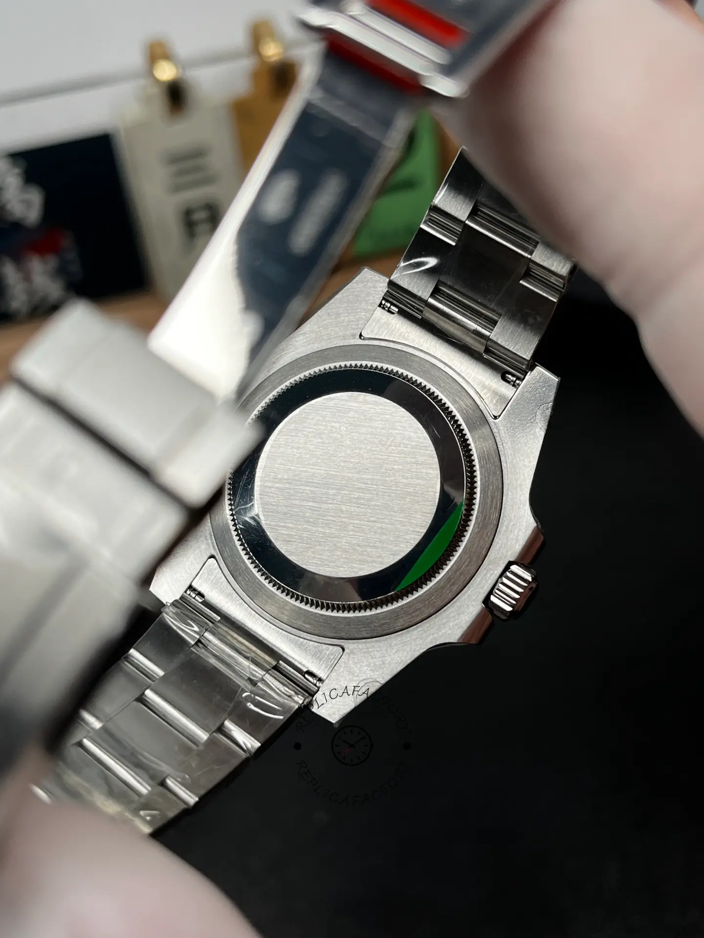 Case back view of Rolex Submariner 124060 with solid screw-down back and Oyster bracelet links.