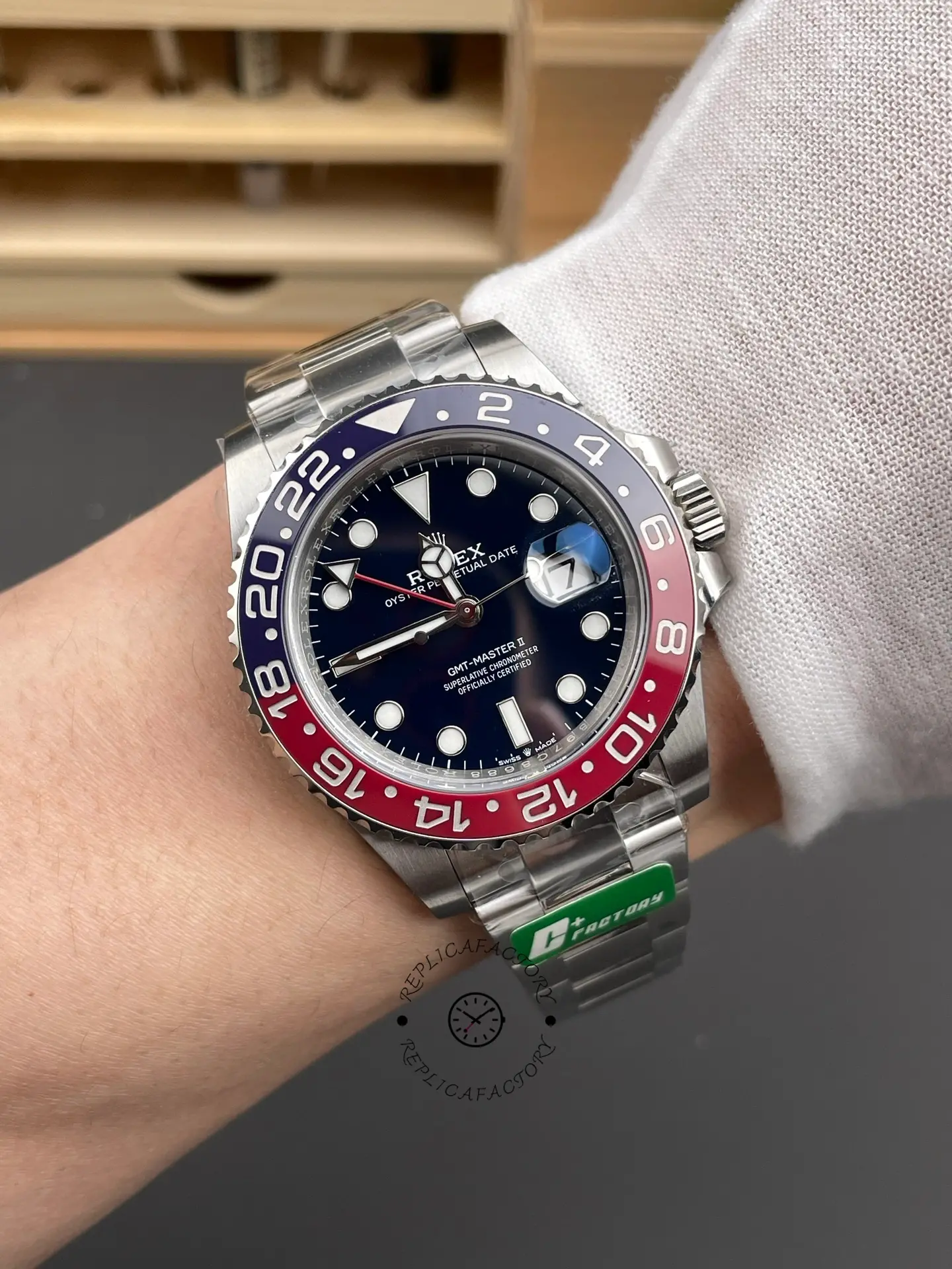 Wrist shot of Rolex GMT-Master II 126719BLRO showing the blue dial and Pepsi bezel on the wrist.