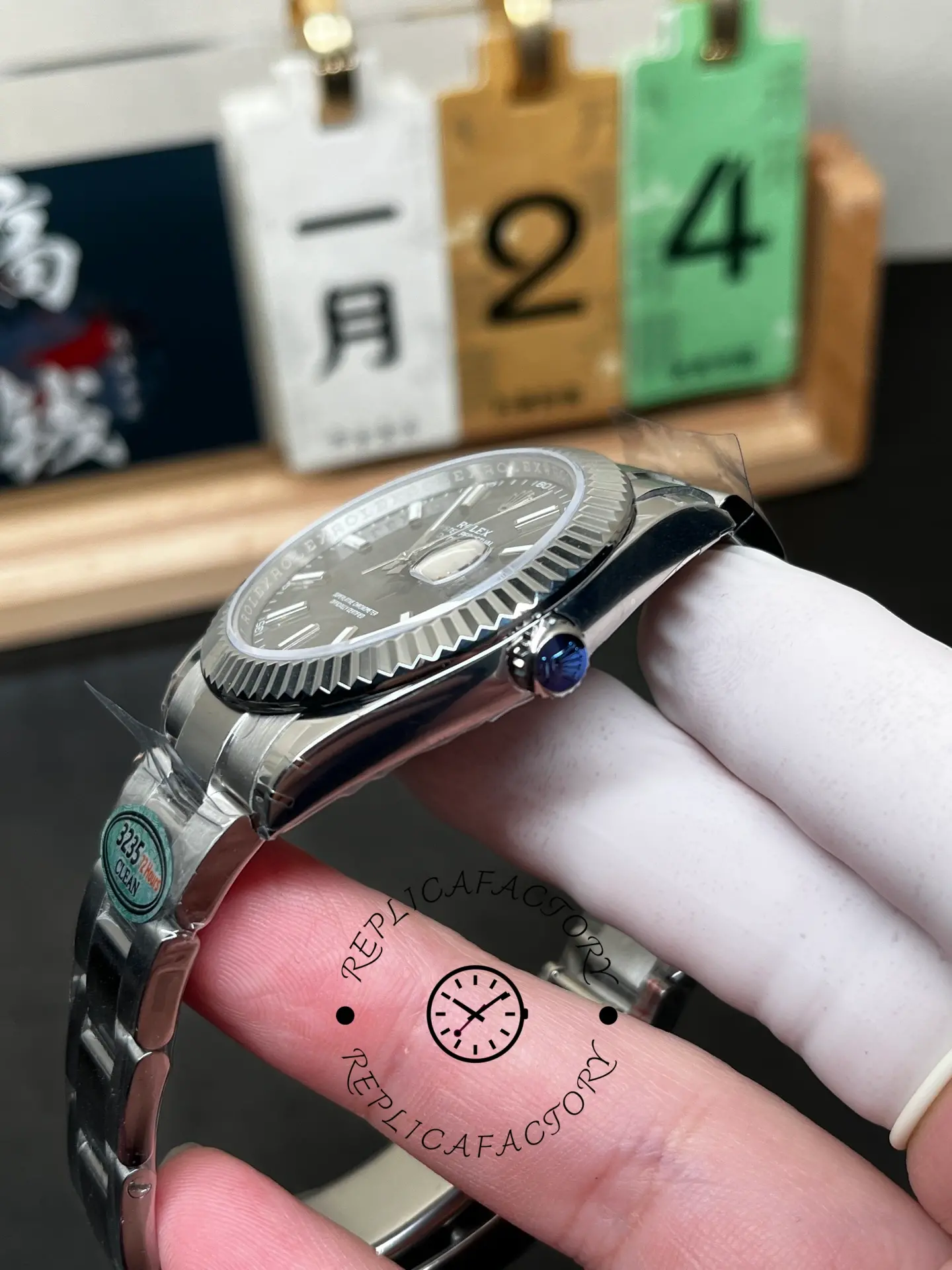 Side profile of Rolex Datejust M126334-0013 showing crown, the fluted bezel and case shape.