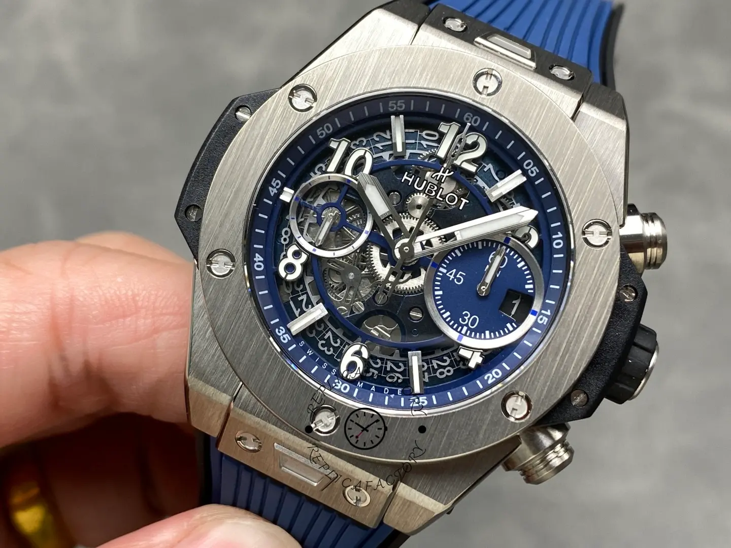 Three-quarter close-up of Hublot Big Bang Unico 441.NX.5171.RX showing crown, pushers and case profile.