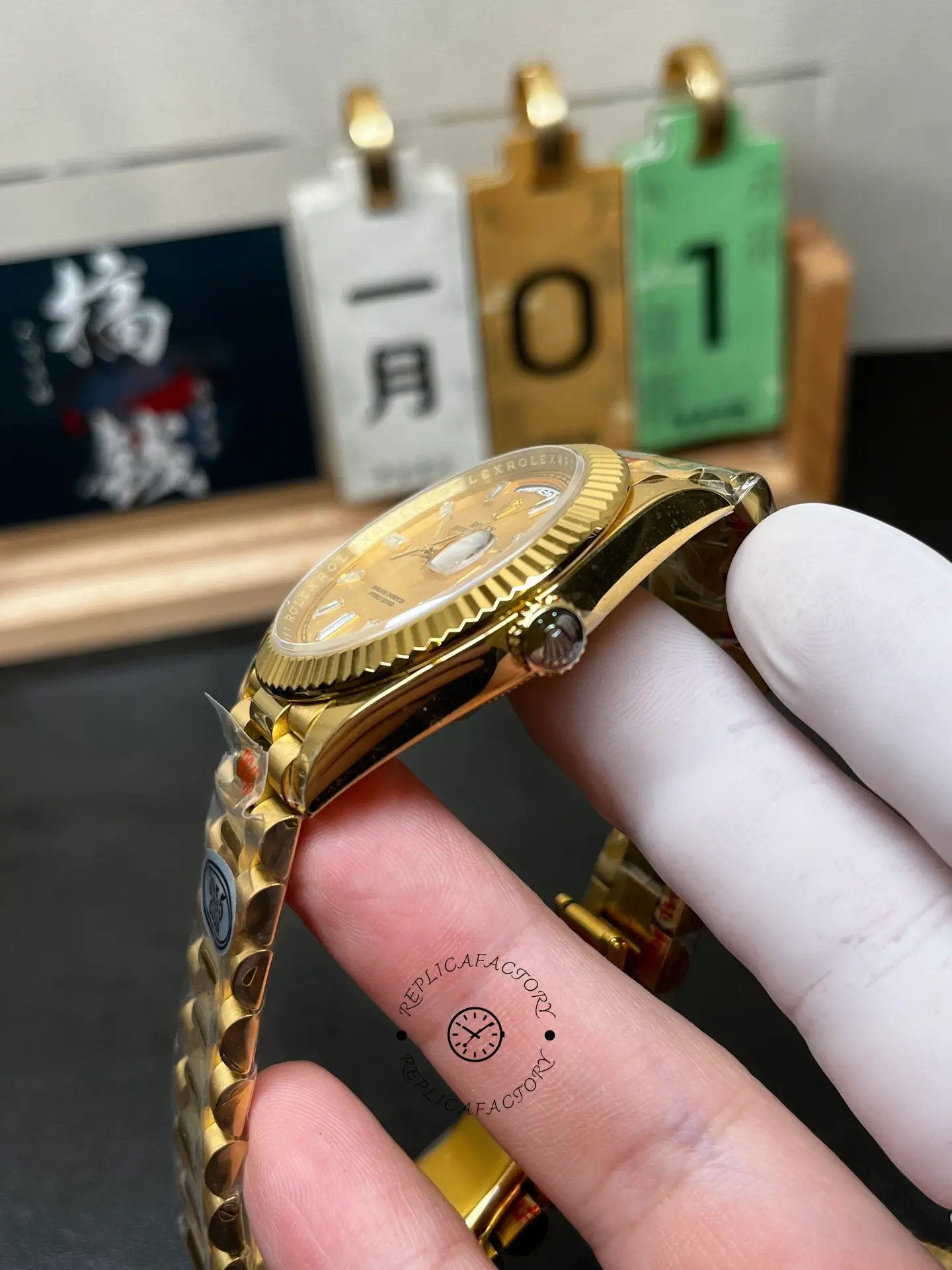 Side profile of Rolex Day-Date 40 m228238-0005 showing fluted bezel, polished case and signed crown.