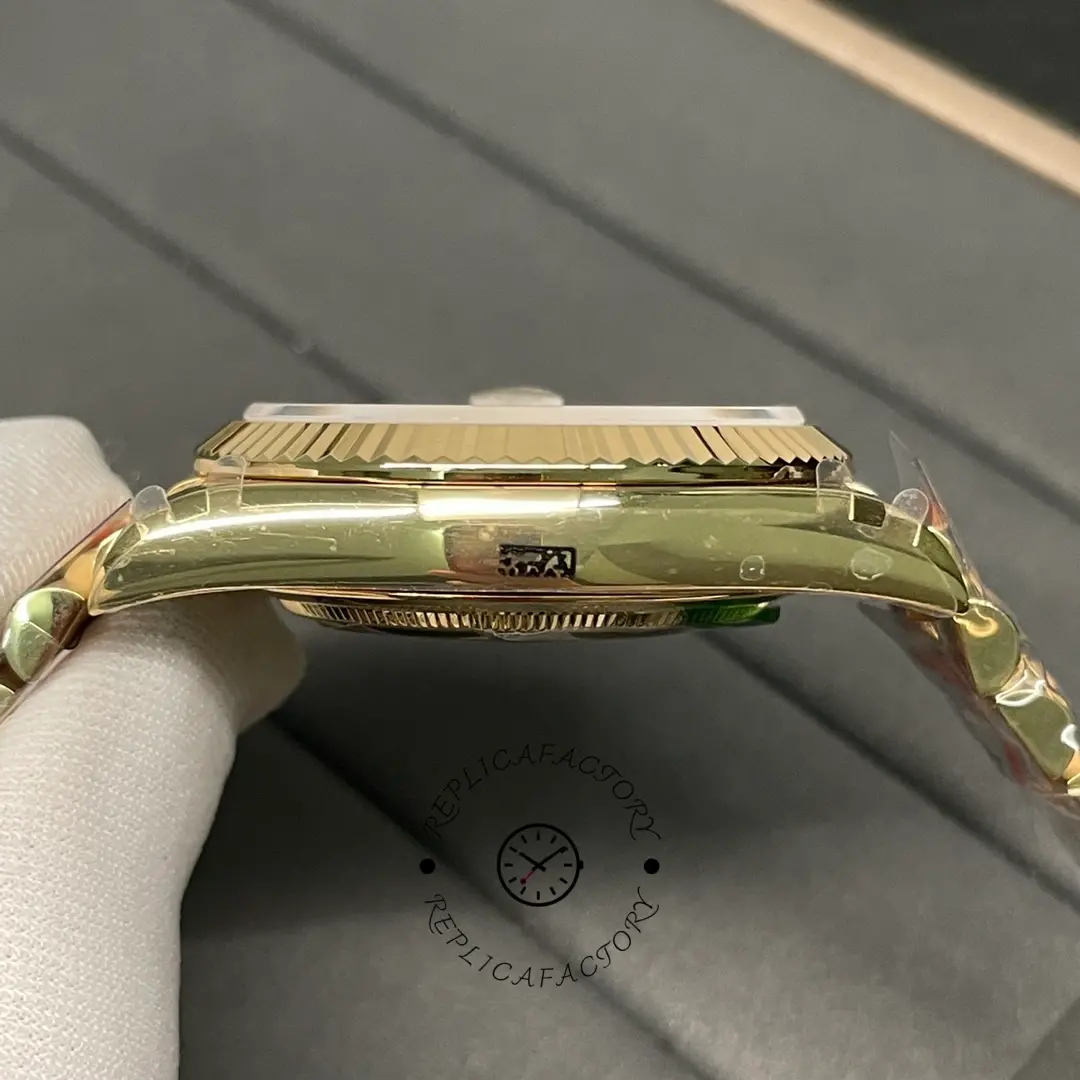 Opposite side profile of Rolex Day-Date 228238 showing the slim case and fluted bezel edge.