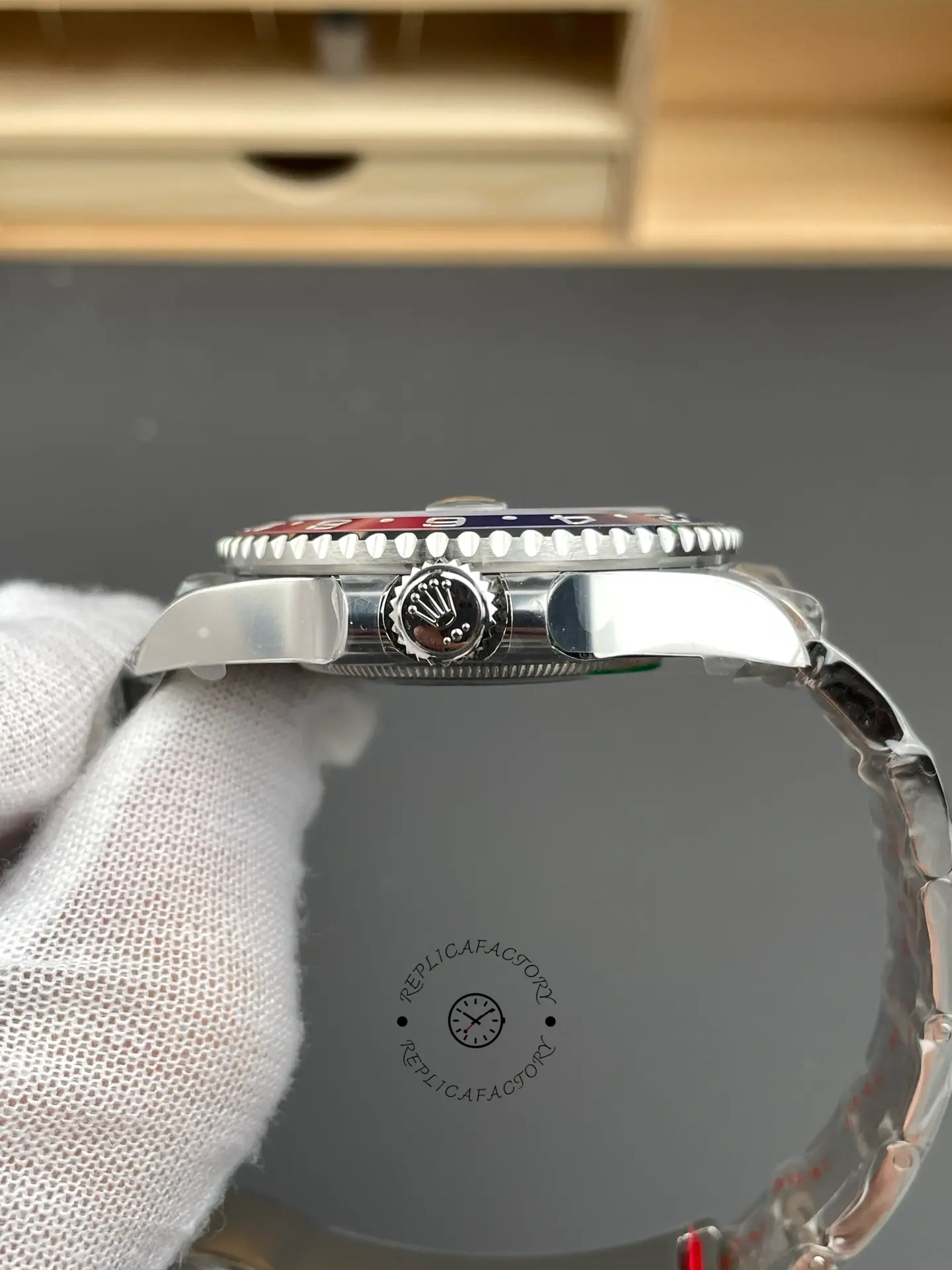 Right side profile of Rolex GMT-Master II 126719BLRO showing the crown and polished case side.