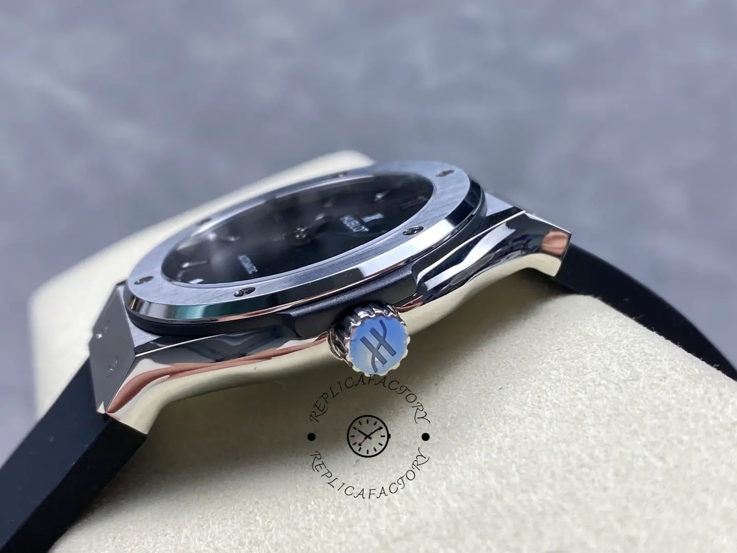 Crown-side close-up of Hublot 542.NX.1171.RX showing signed crown and polished case curve.