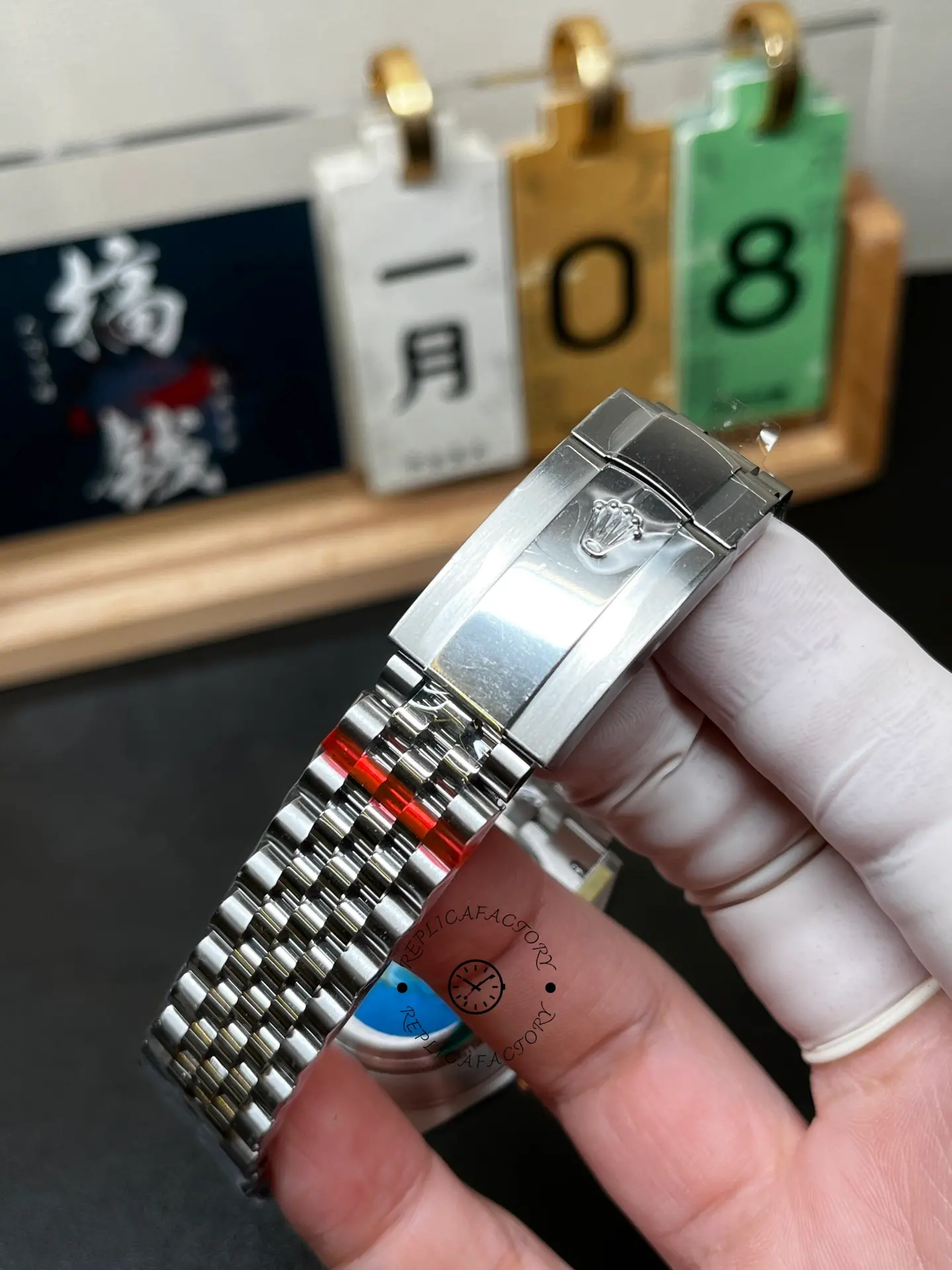 Clasp view of Rolex Datejust 126334-0028 showing Jubilee bracelet clasp with Rolex crown detail.