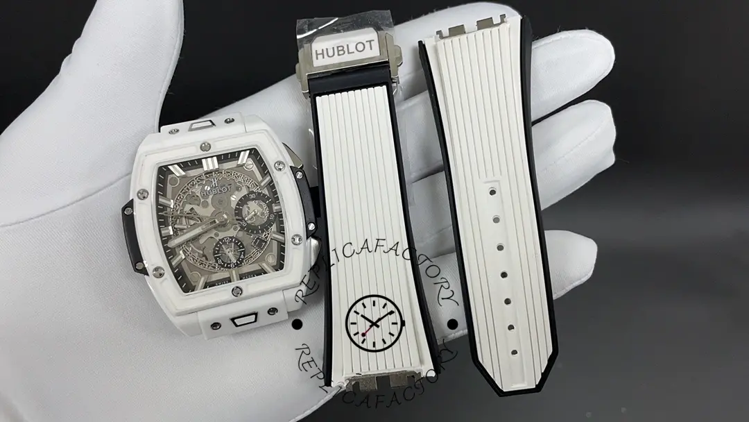 Strap set photo of Hublot Spirit of Big Bang 642.HX.0170.RX showing extra white strap pieces beside the watch.