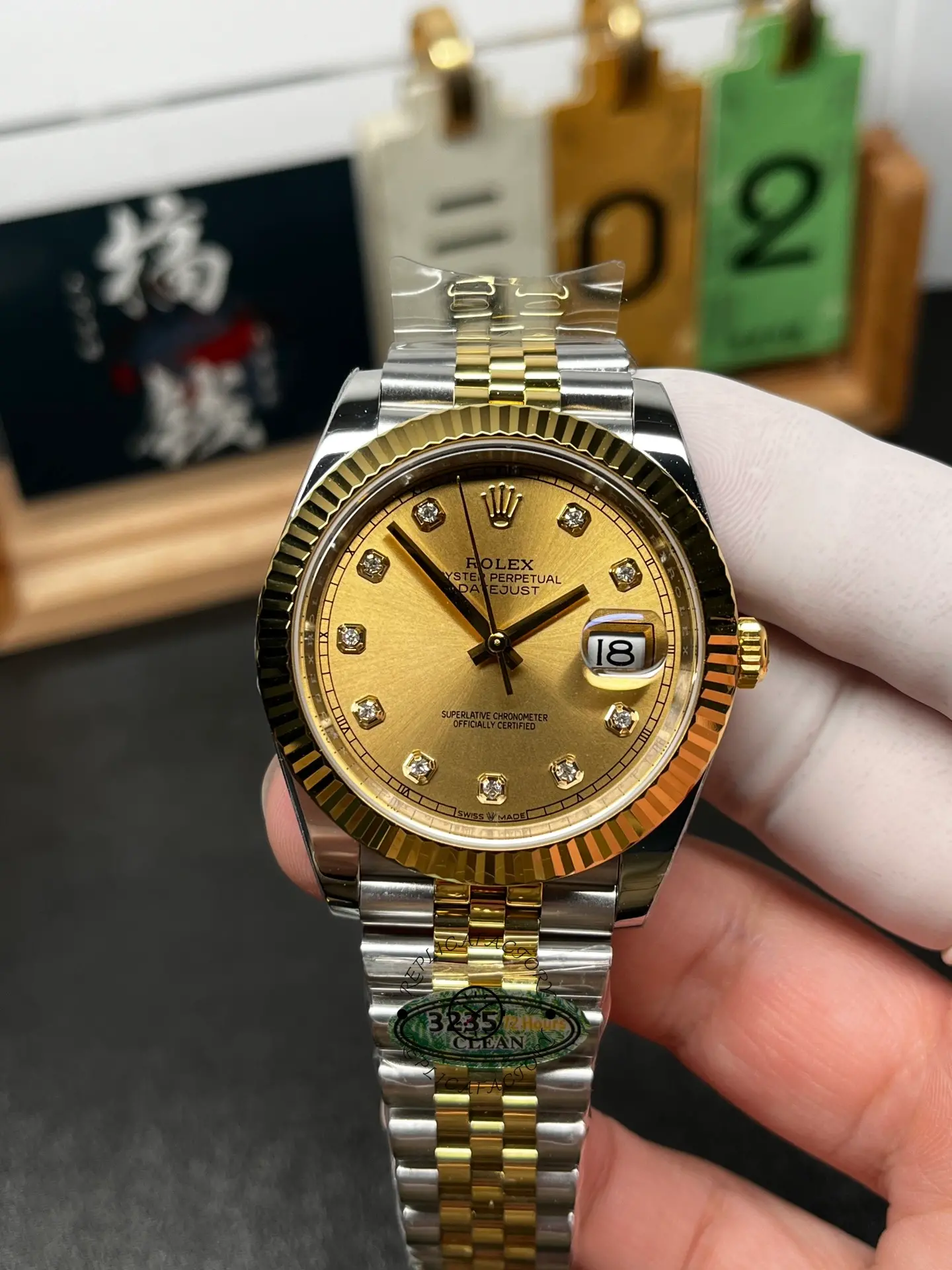 Front view of Rolex Datejust M126333-0012 with champagne diamond dial, fluted bezel, and date magnifier.