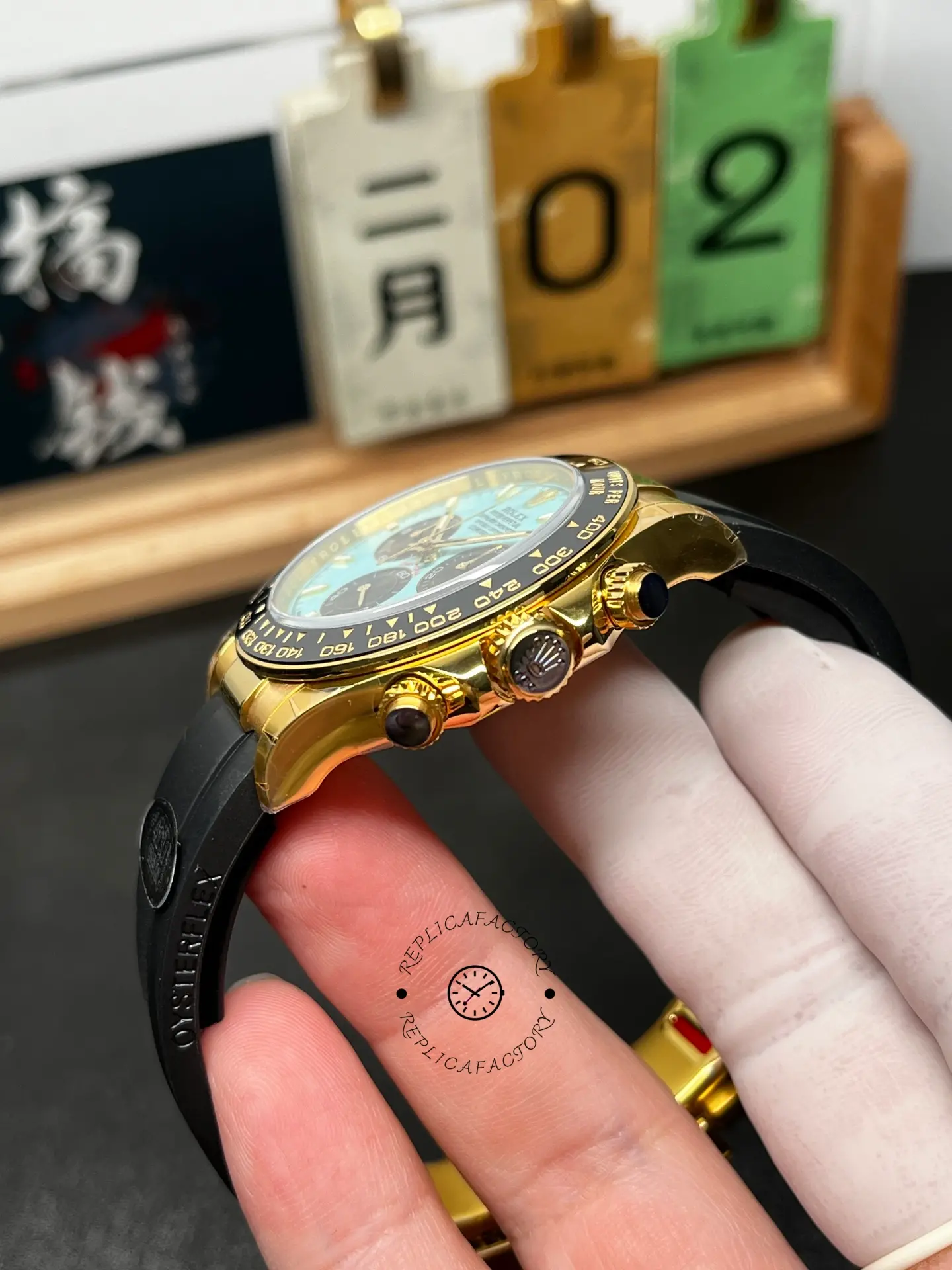 Side profile of Rolex Daytona 126518LN-0014 showing gold crown, chronograph pushers, and Oysterflex strap.