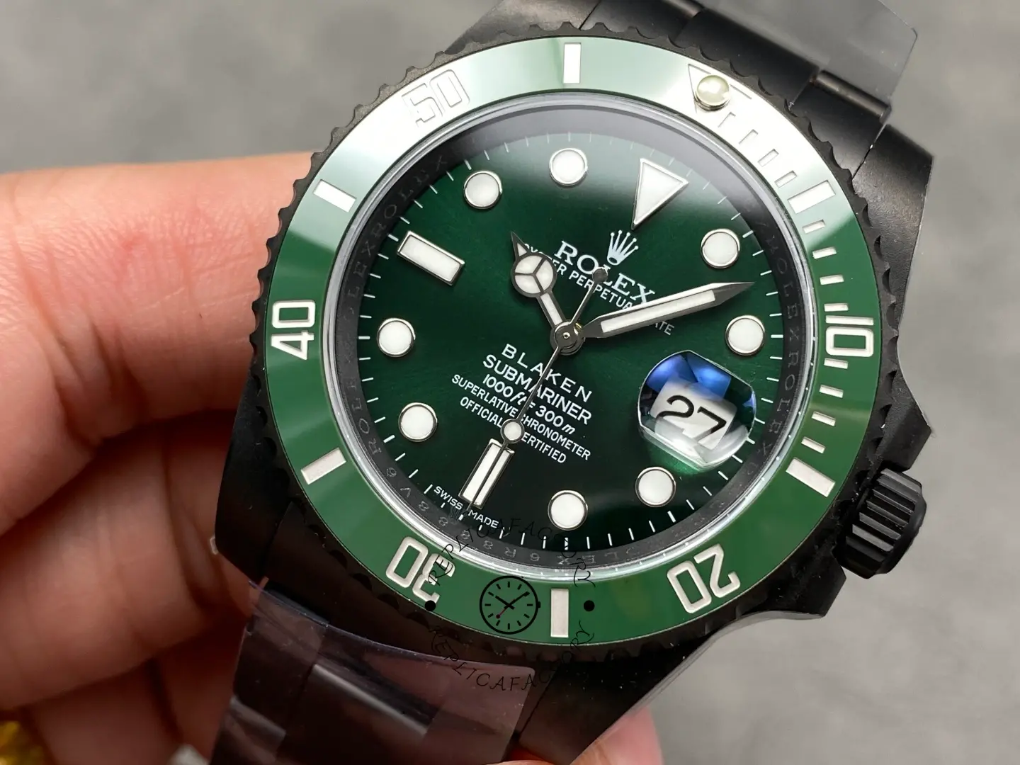 Close-up dial view of Rolex Submariner 116610LV highlighting luminous markers and bezel.