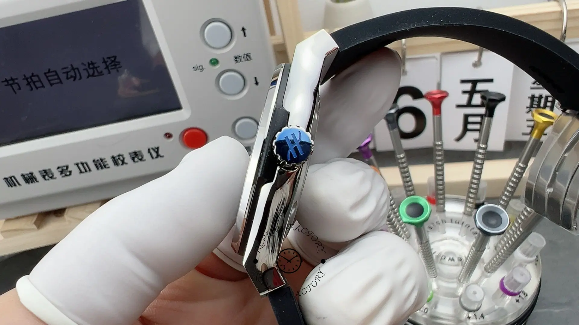 Side view of Hublot Classic Fusion 542.NX.1171.RX on wrist, black rubber strap and crown.