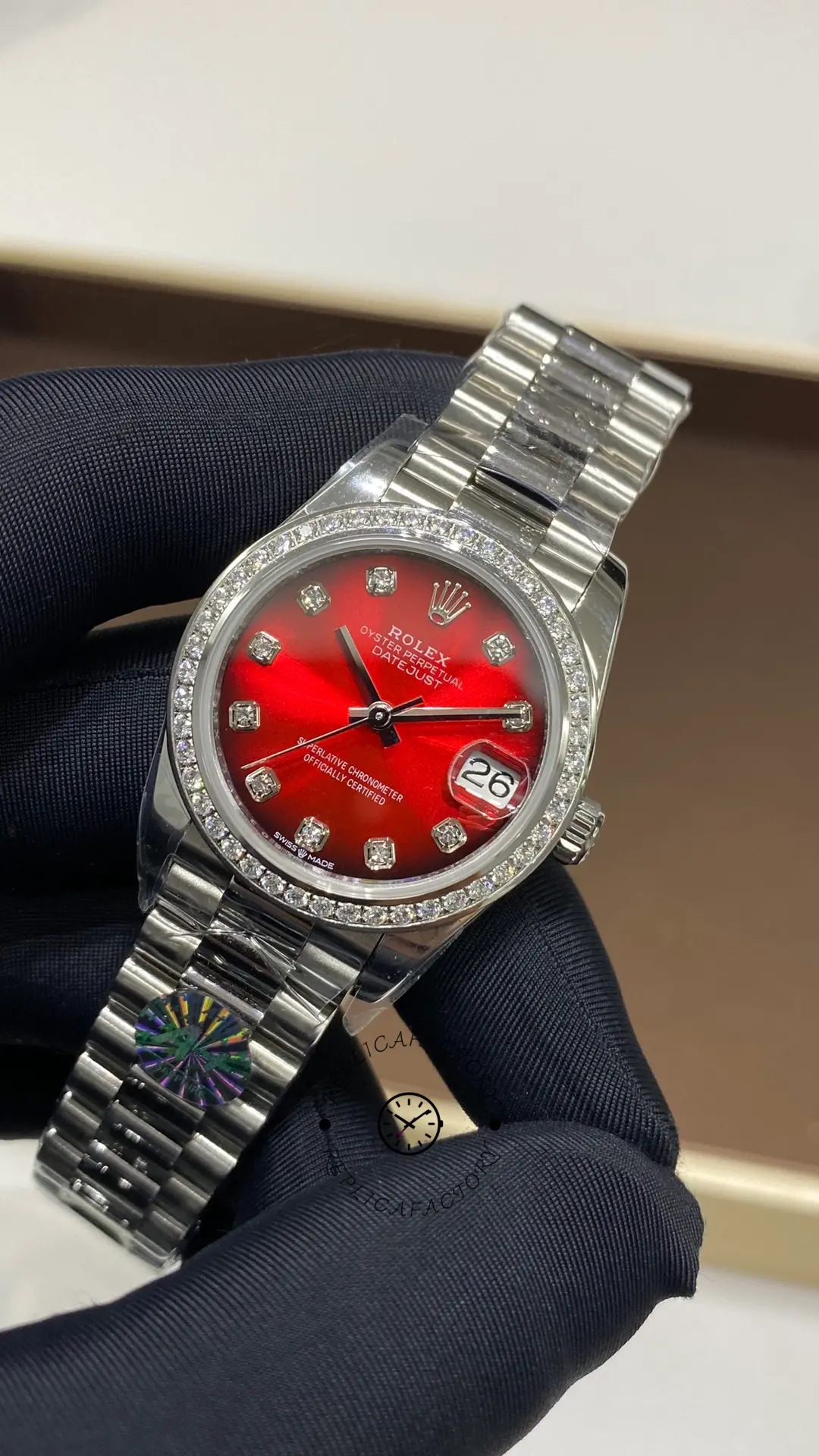 Angled front view of Rolex Datejust 31 278289RBR-0028 with red gradient dial and diamond-set bezel.