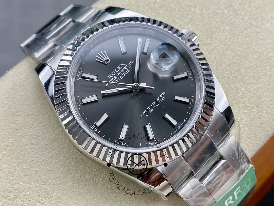 Close front view of Rolex Datejust M126334-0013 showing the slate dial and date magnifier.