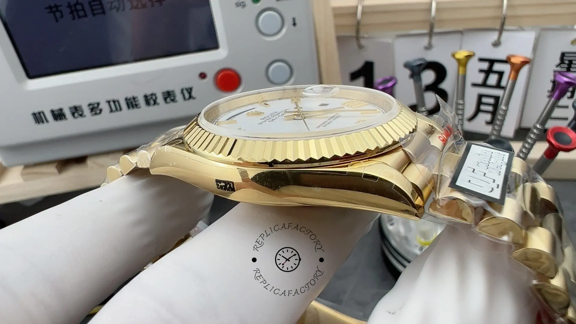 Left side profile of Rolex Day-Date 228238 showing polished case body and bezel thickness.