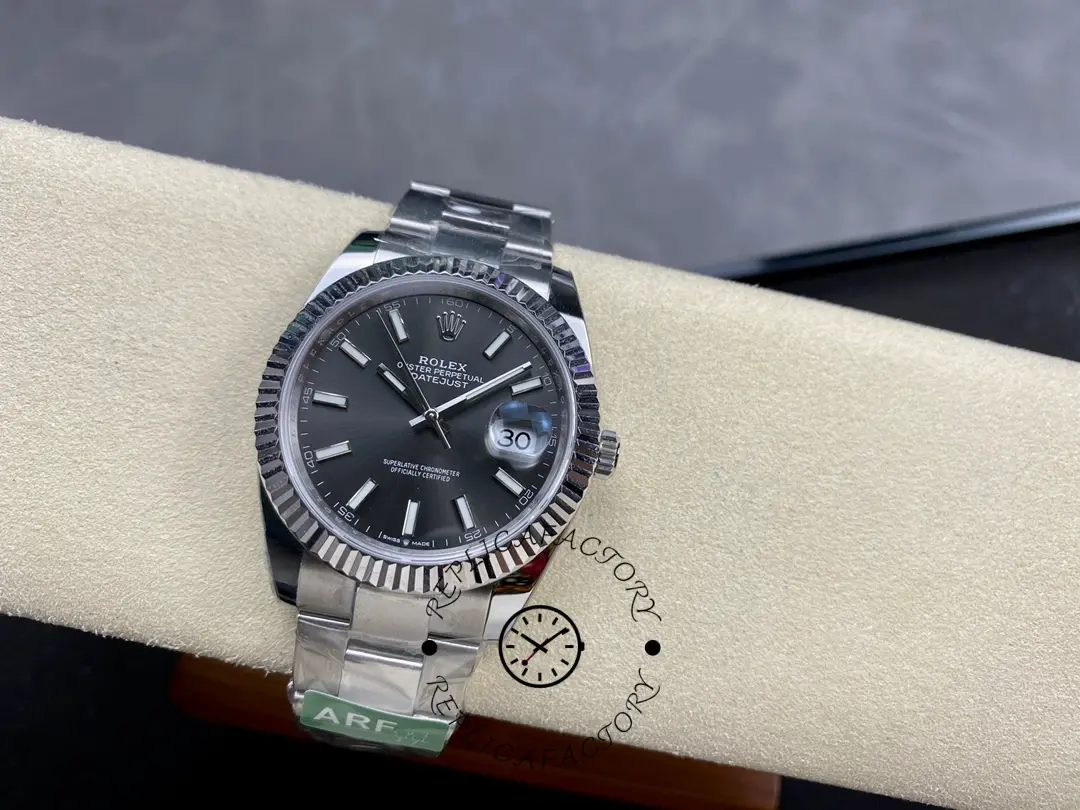 Front view of Rolex Datejust M126334-0013 on cushion showing the full dial and bracelet.