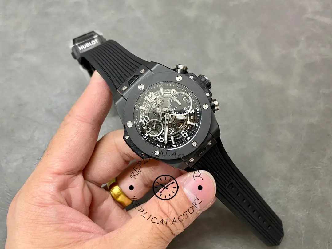 Wrist shot of Hublot Big Bang 421.NL.5170.RX black case with rubber strap.