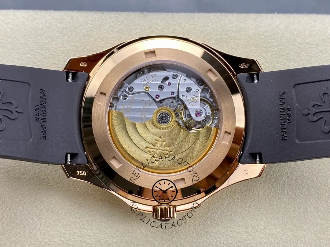 Caseback close-up of Patek Philippe Aquanaut 5167R-001 showing gold rotor through sapphire back.