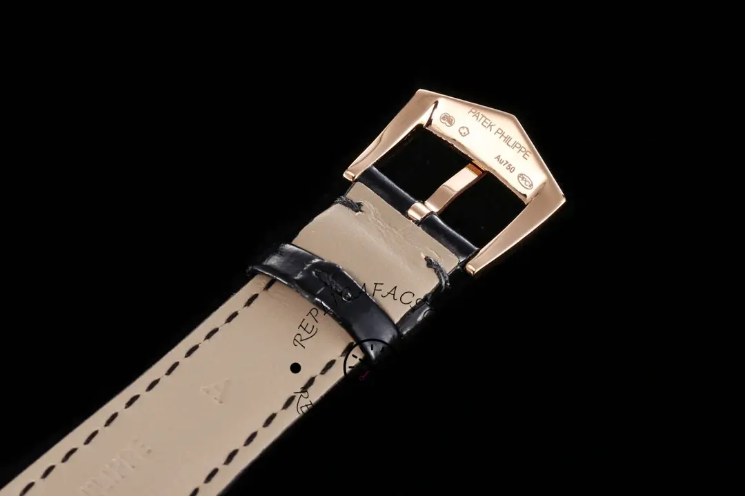 Buckle detail of the Patek Philippe Calatrava 5119R showing the rose gold clasp on the leather strap.