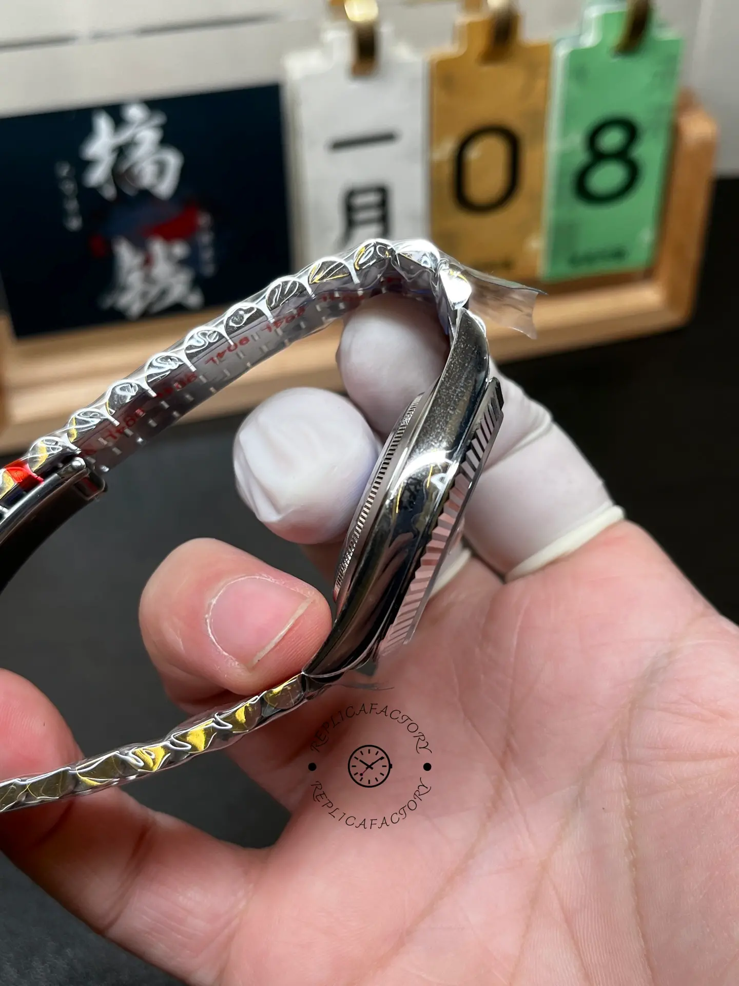 Opposite side profile of Rolex Datejust 126334-0028 showing case curvature and bezel edge.