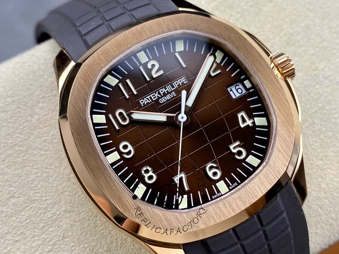 Macro dial view of Patek Philippe Aquanaut 5167R-001 showing embossed pattern and Arabic numerals.
