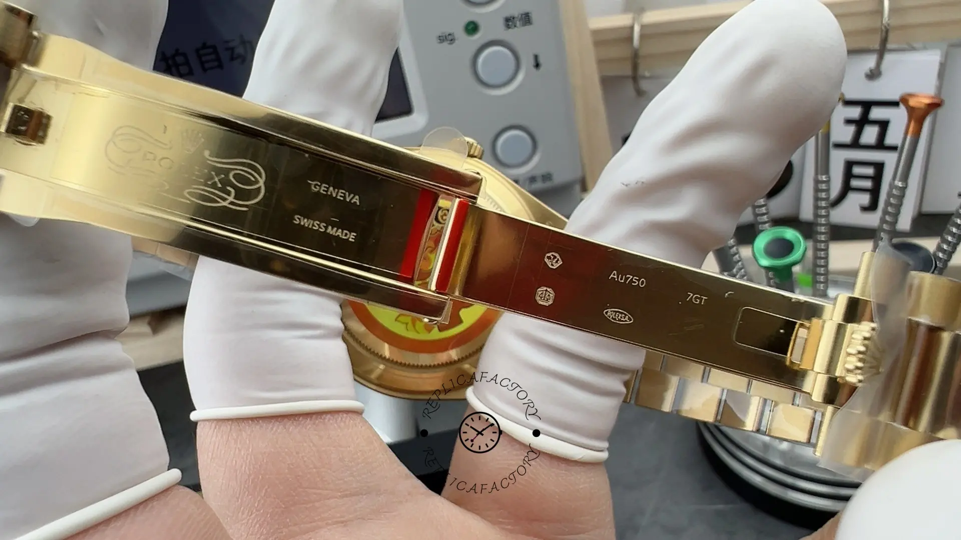 Inner clasp close-up of Rolex Day-Date 228238 showing engraving details on the gold-tone clasp.