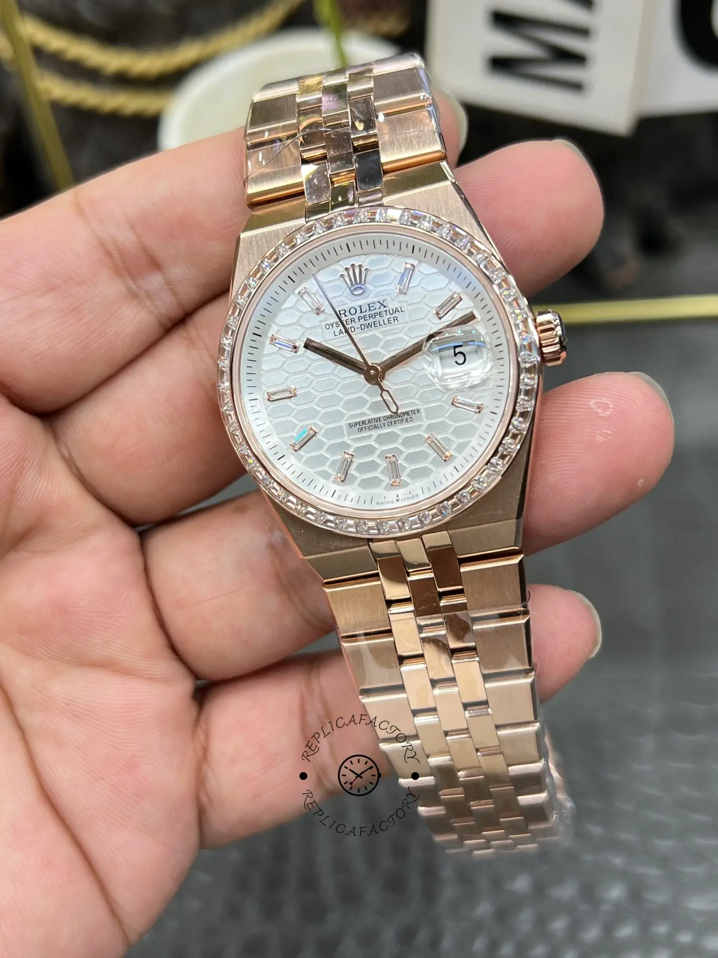 Front-right view of Rolex Land Dweller m127385tbr-0003 showing diamond-style bezel and rose gold-tone case.