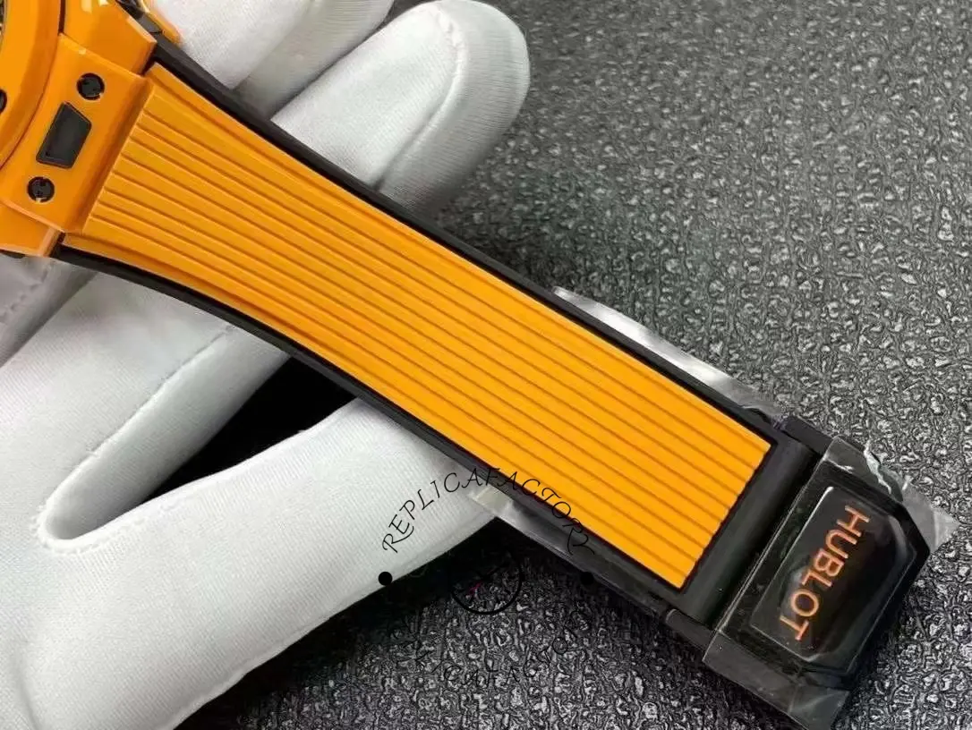 Clasp and strap laid flat for Hublot Big Bang Unico 441.CU.5910.RX, orange rubber strap detail.