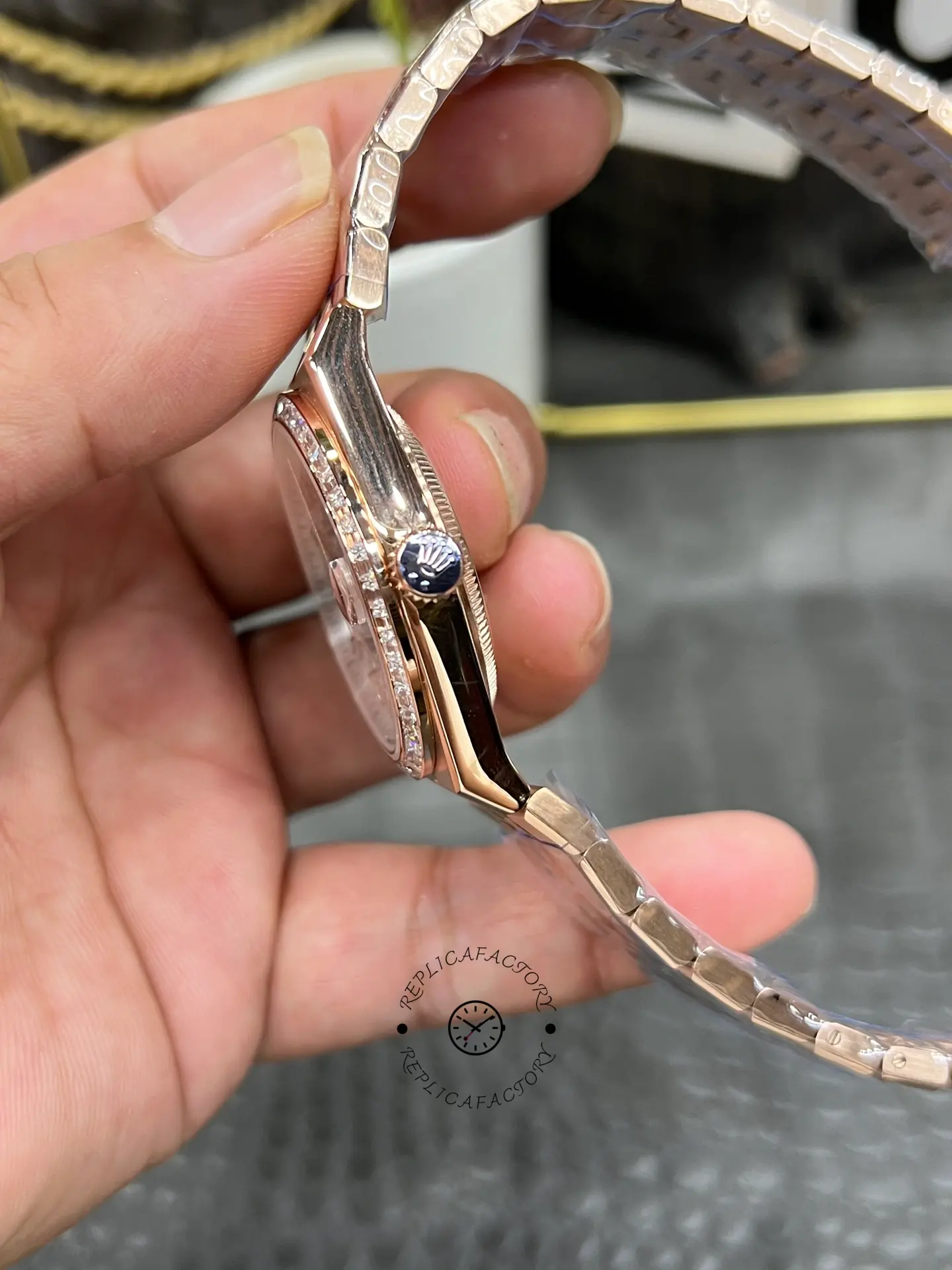 Side view of Rolex Land Dweller m127385tbr-0003 showing the crown and slim case profile.