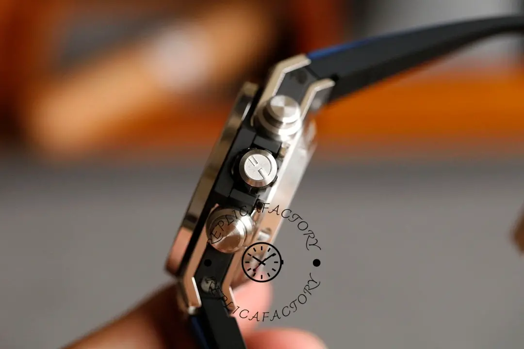 Side profile of Hublot Big Bang Unico 411.NM.1170.RX, crown and chronograph pushers detail.